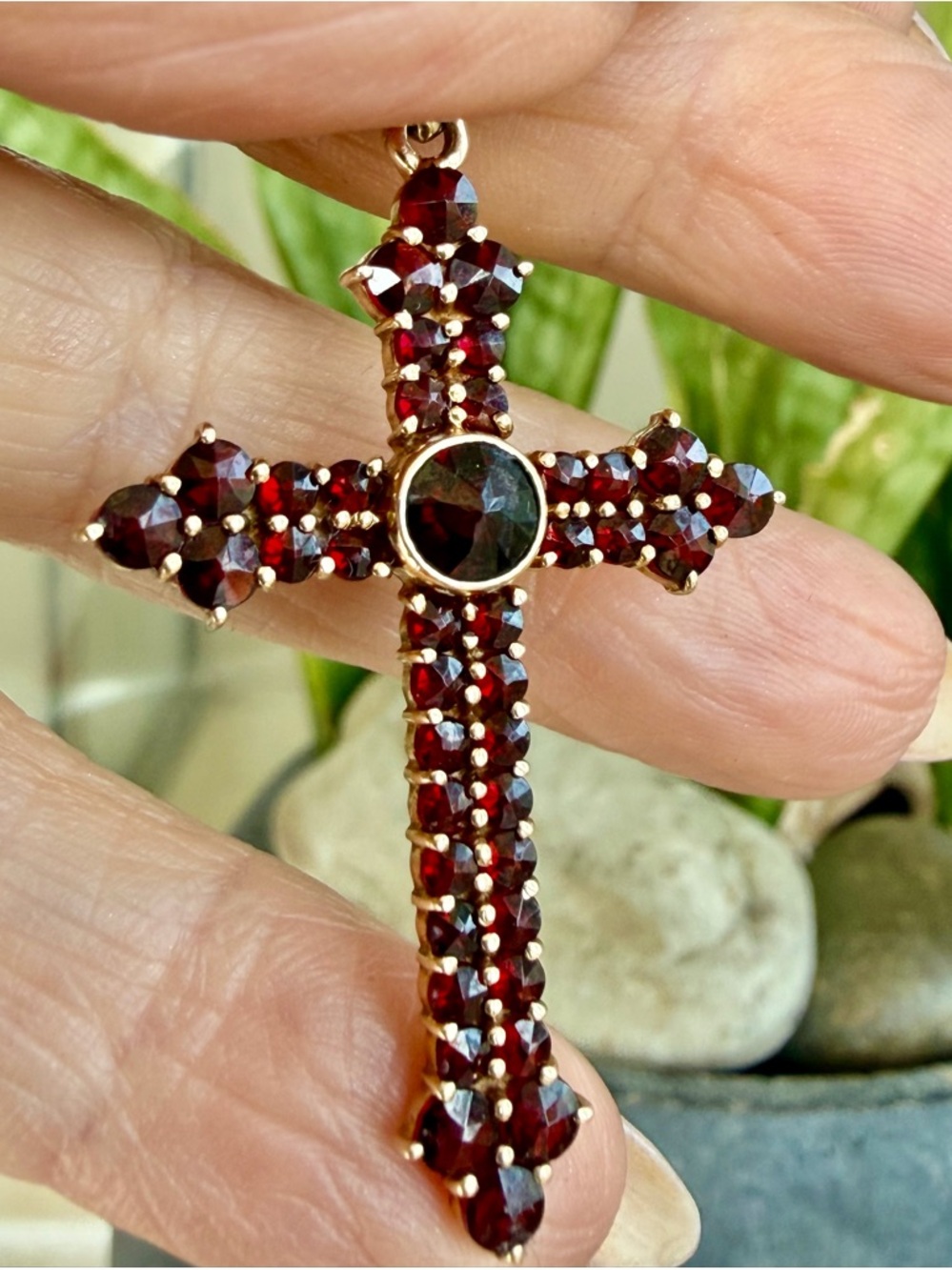 14 karat gold and garnet cross